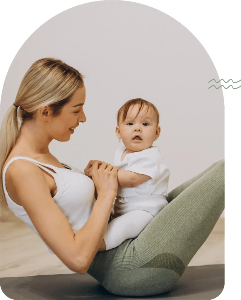 mama na vježbama s bebom